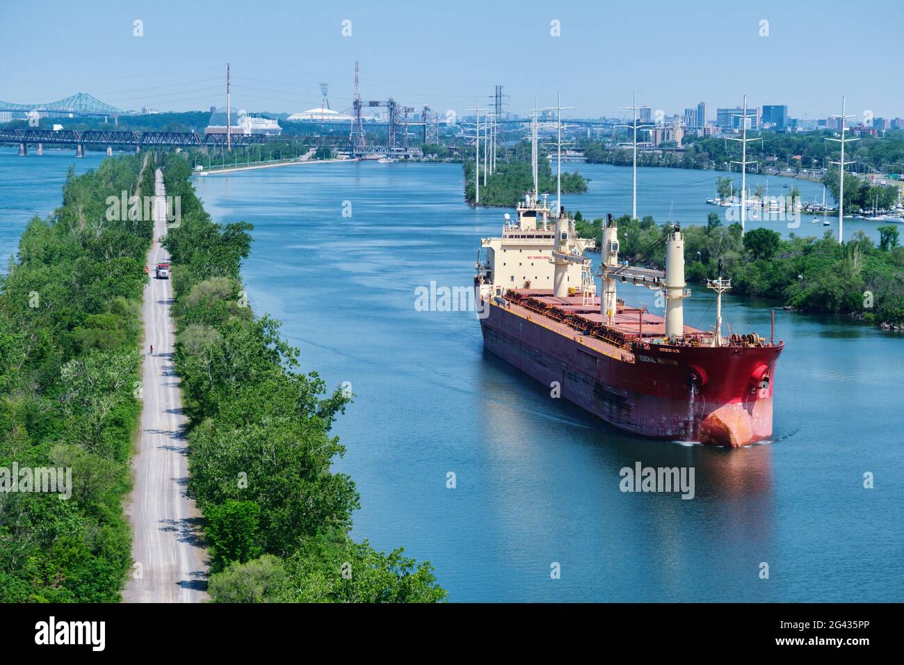 Montreal, CA - 7 June 2021: Aerial view of Federal Hudson bulk carrier moving on Saint-Lawrence seaway Stock Photo