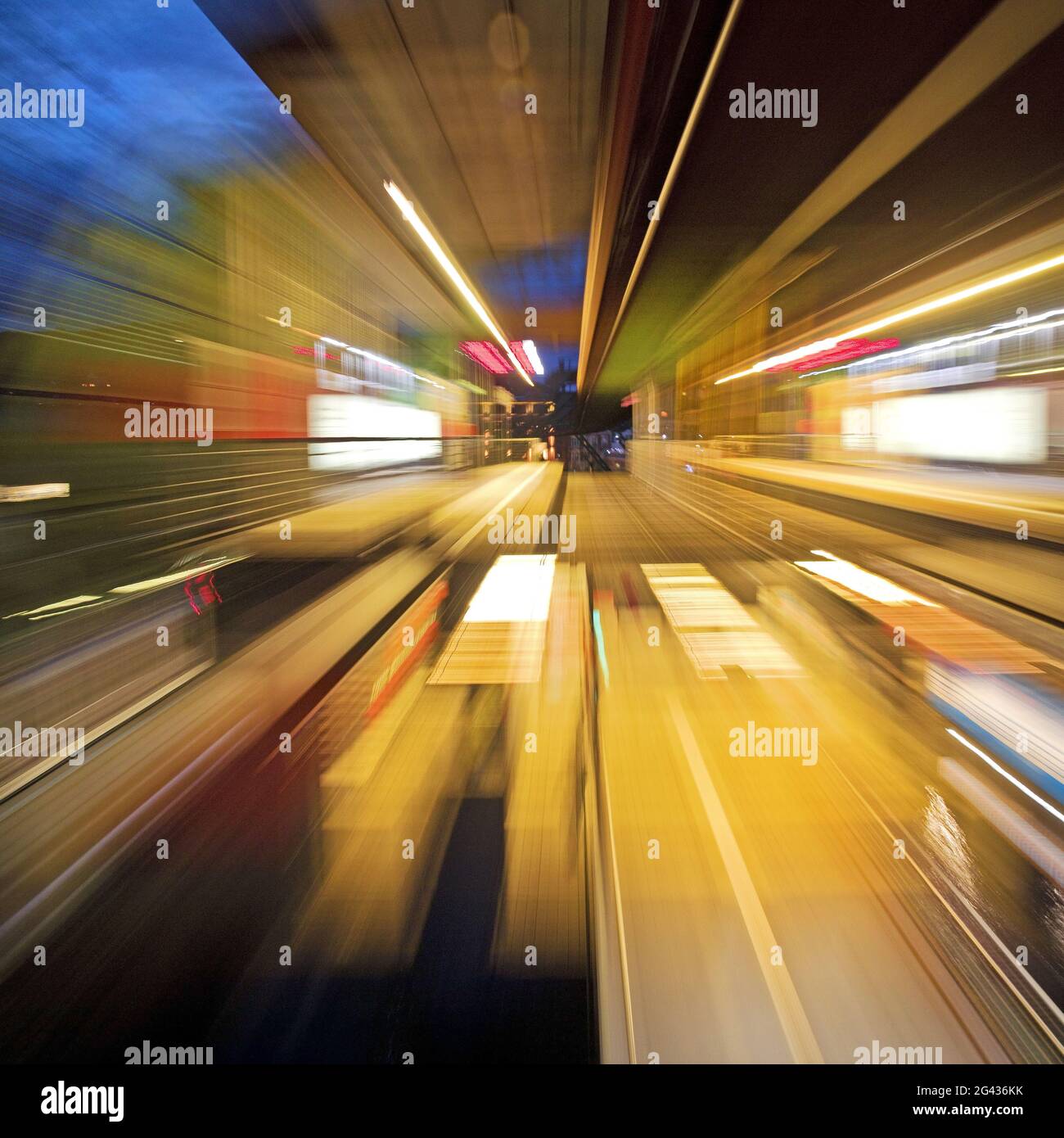Colorful, semi-abstract traces of movement of a moving suspension railway, Wuppertal, Germany Stock Photo