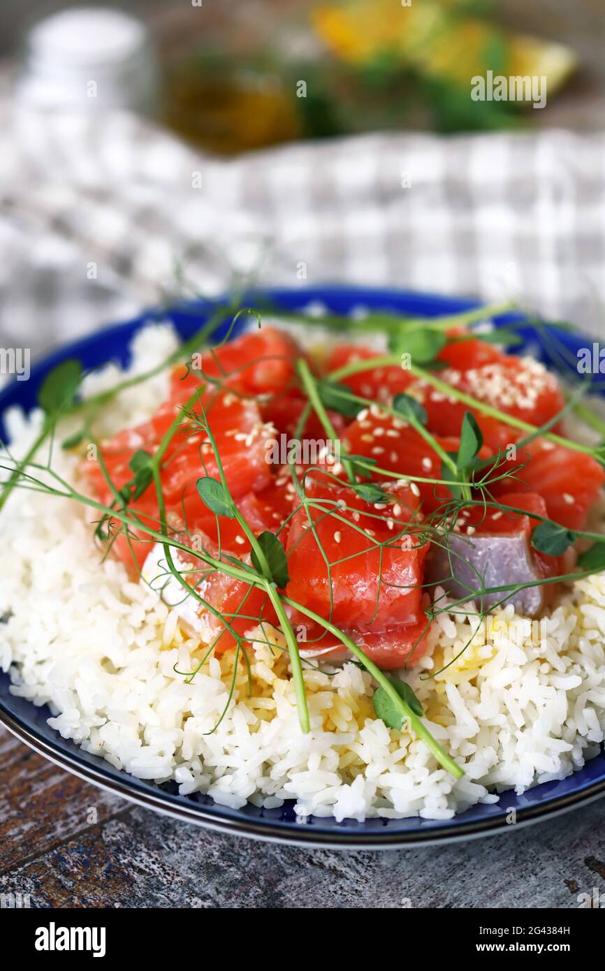 https://c8.alamy.com/comp/2G4384H/poke-bowl-with-salmon-and-microgreens-healthly-food-2G4384H.jpg