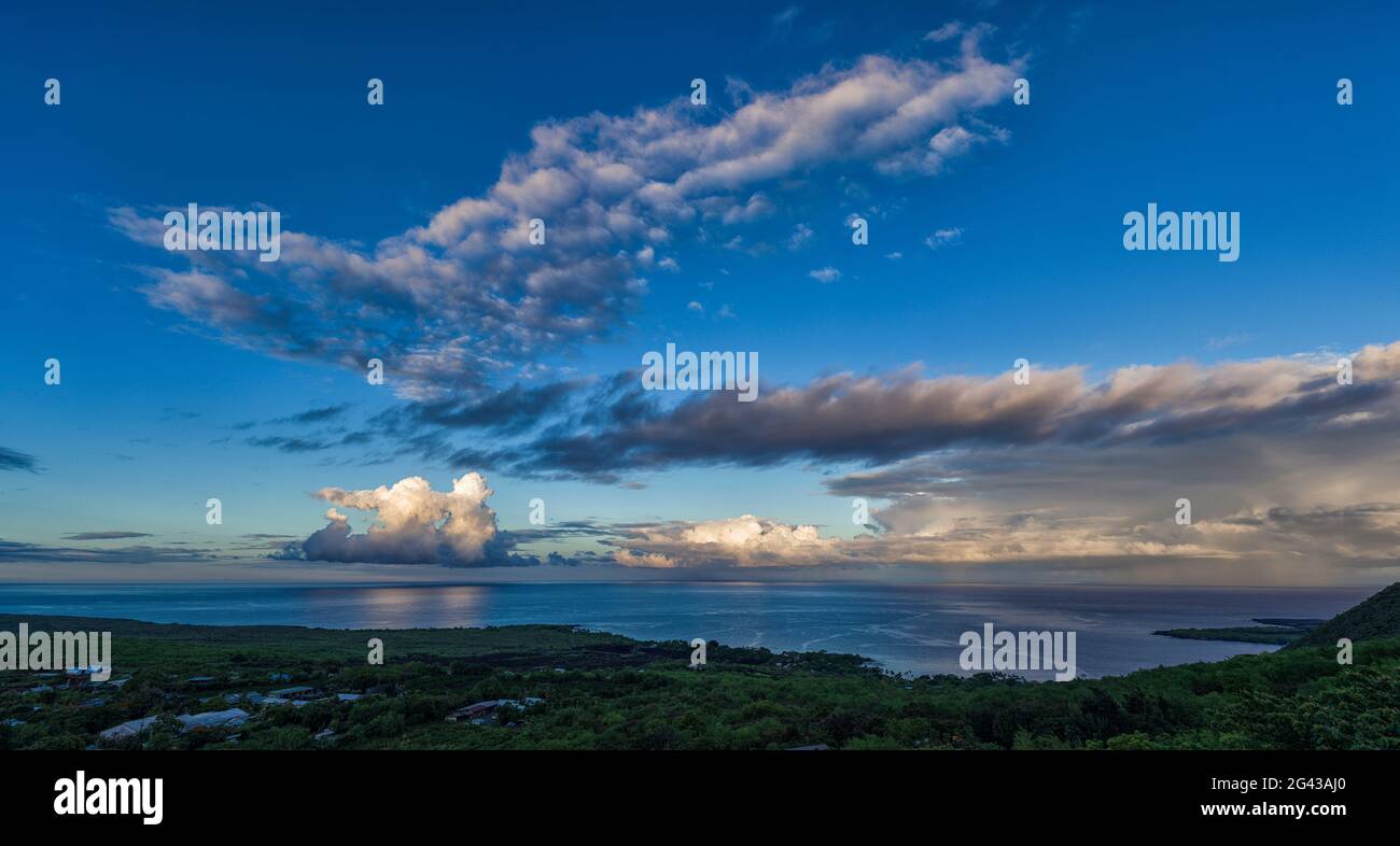 Clouds above Kealakekua Bay coast at sunrise, South Kona District, Hawaii, USA Stock Photo