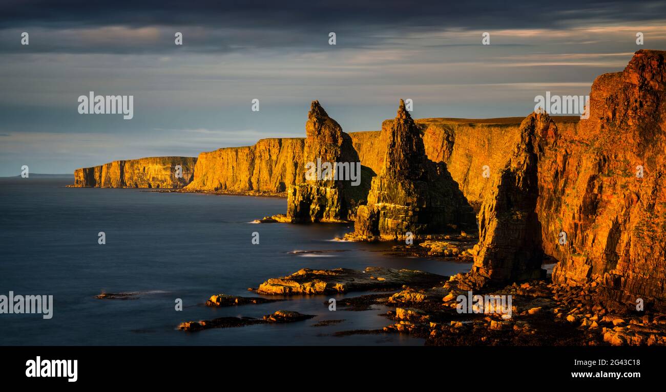 Landscape with coastal cliffs at sunrise, Duncanby Head, Scotland, UK Stock Photo