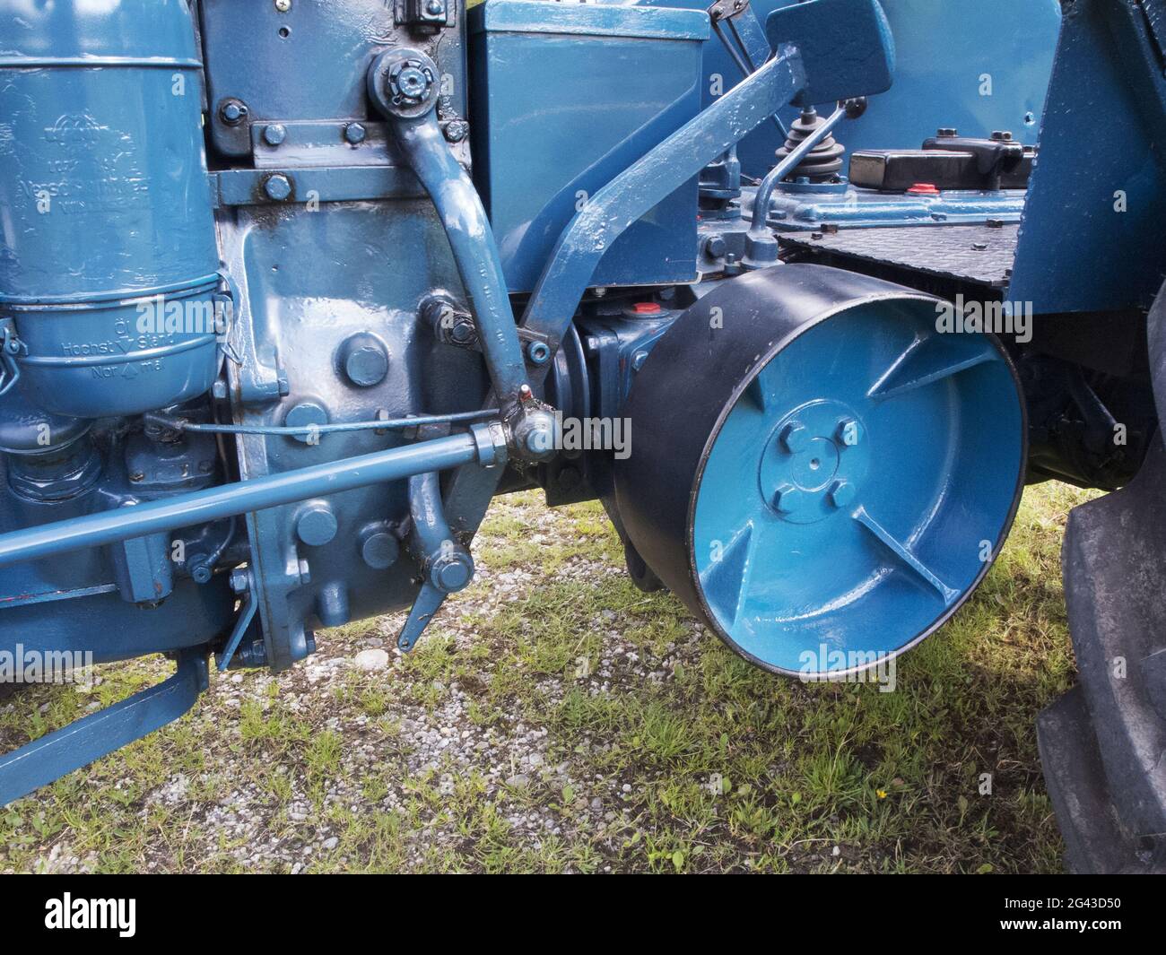 Belt drive wheel on a tractor Stock Photo