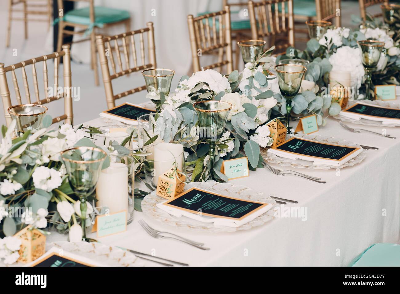 Wedding table setting decor with white flowers Stock Photo