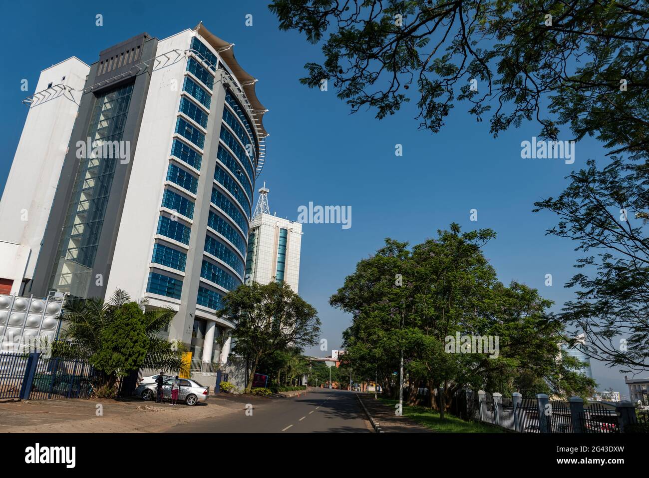Street and high-rise office building in the city center, Kigali, Kigali Province, Rwanda, Africa Stock Photo