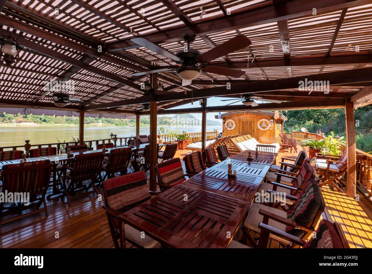 Restaurant area on board the river cruise ship Mekong Sun on the Mekong river, Luang Prabang, Luang Prabang Province, Laos, Asia Stock Photo