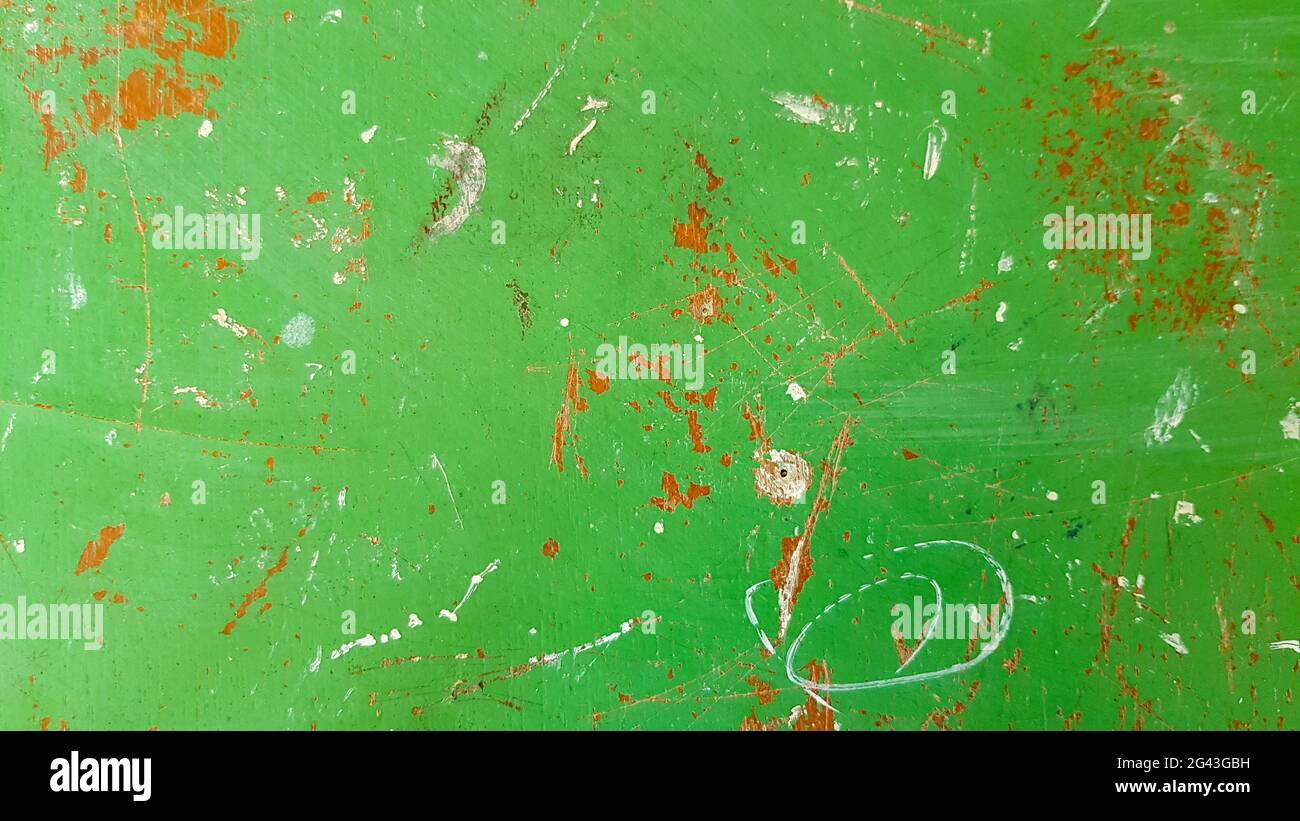 Old green grungy wall background or texture Stock Photo