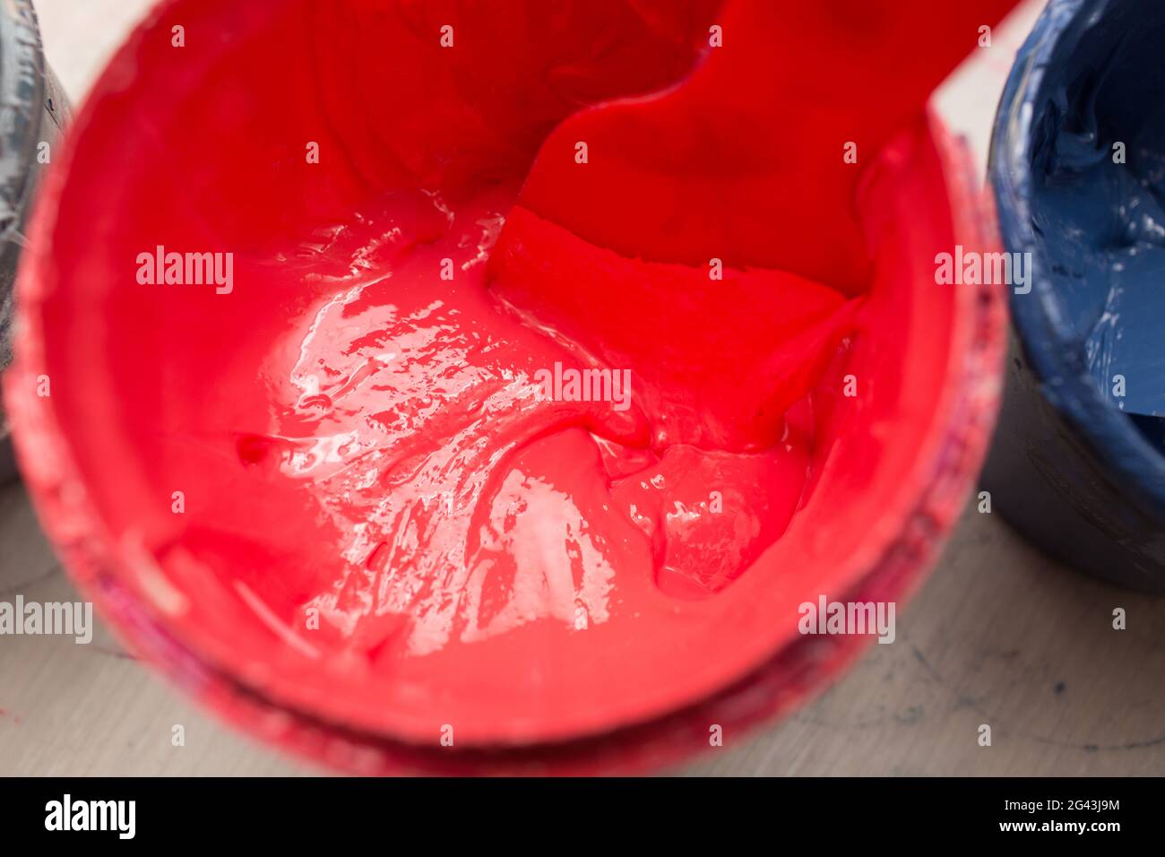 Silk screen printing red paint. Serigraphy. Plastisol paint Stock Photo