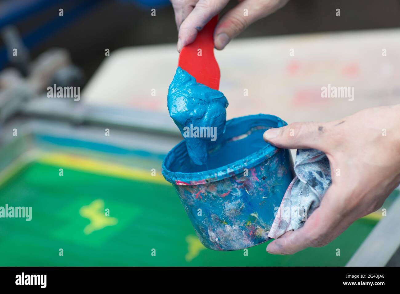 Silk screen printing. Serigraphy. Color paints and fabric. Plastisol