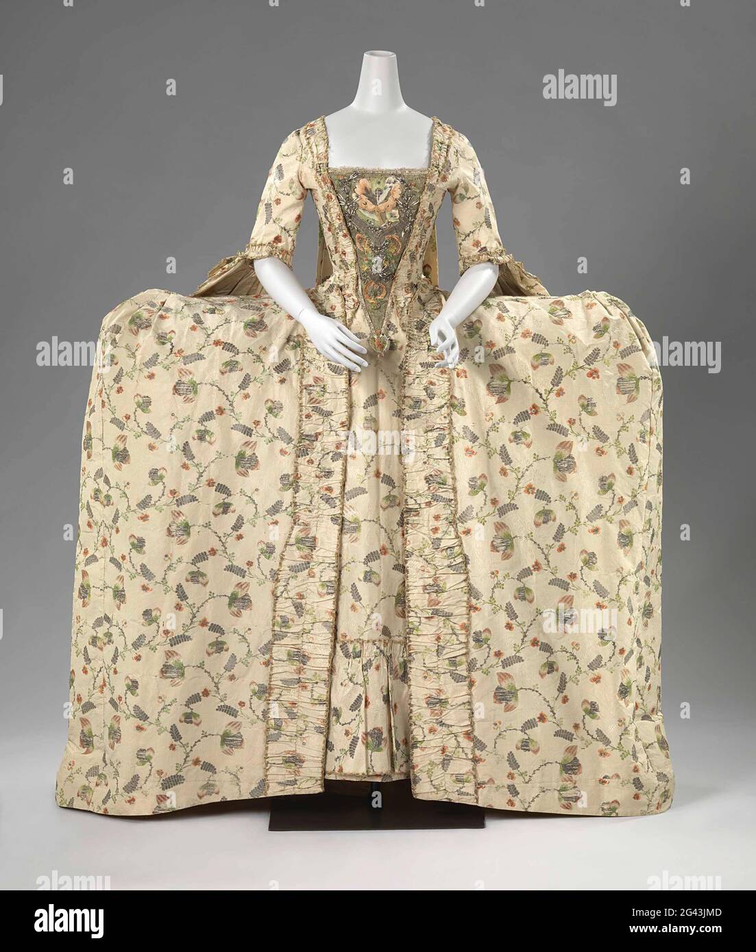 Soon or manteau from silk brocade, with a cream-colored fond on which  multicolored sides, gold and silver flowers are woven. Soon or manteau from  silk brocade, with a cream-colored fond on which