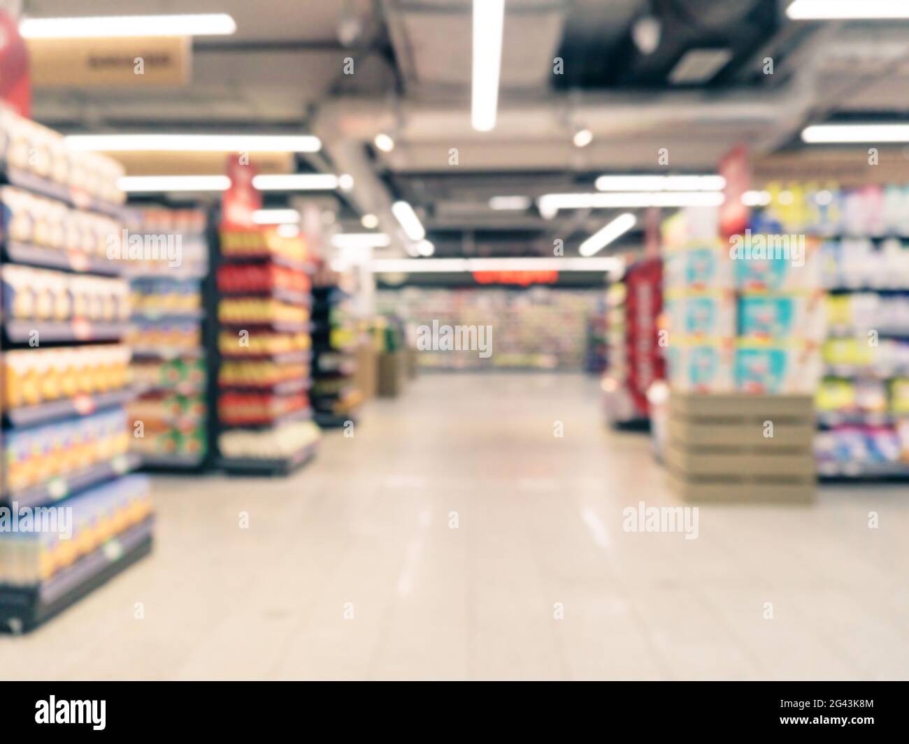 Blurred supermarket aisle Stock Photo