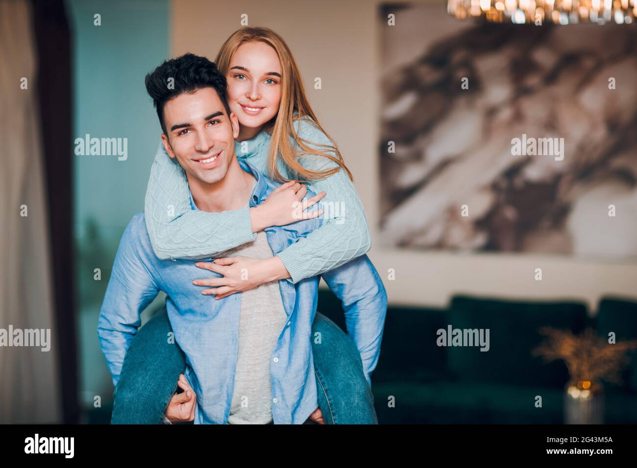 Romantic man carrying woman in hi-res stock photography and images - Alamy