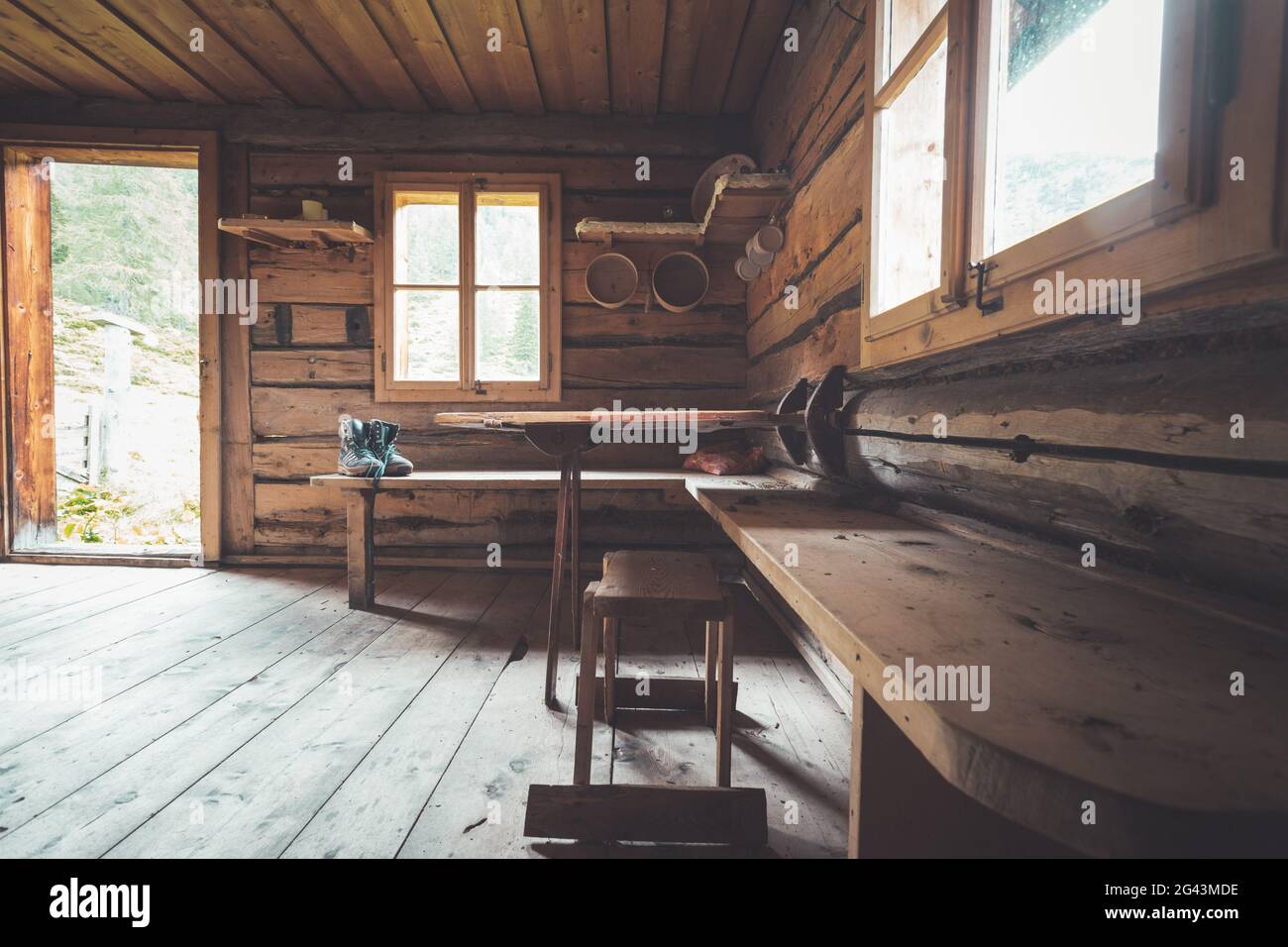 Abandoned mountain hut or chalet in Austria: rustic wooden interior Stock Photo
