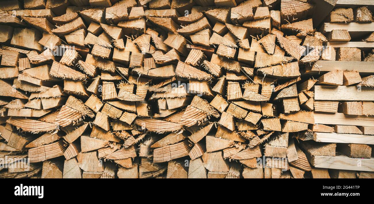 Wood pile background texture. Horizontal banner Stock Photo