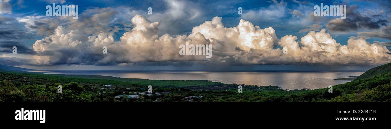 Cumulus clouds above Kealakekua Bay coast, Hawaii, USA Stock Photo