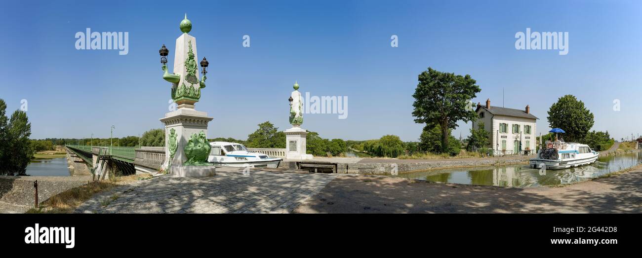 Statues and bridge over Loire river, Briare, Loire Valley, France Stock Photo