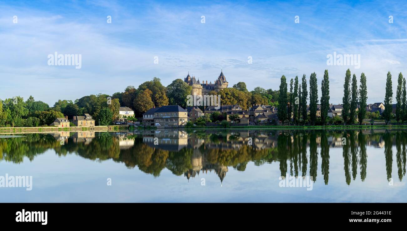 Chateau across lake, Ille et Vilaine, Combourg, Bretagne, France Stock Photo