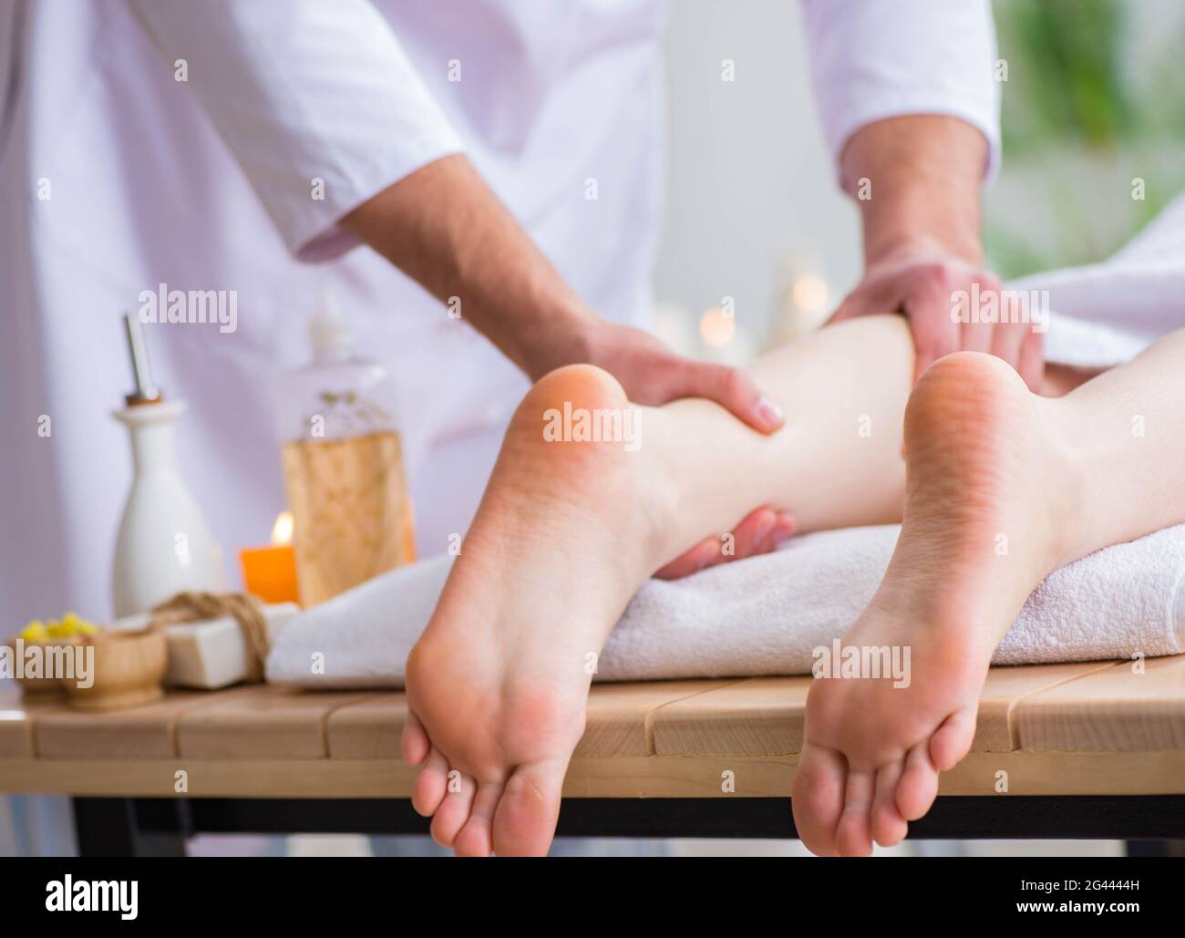 Foot massage in medical spa Stock Photo Alamy