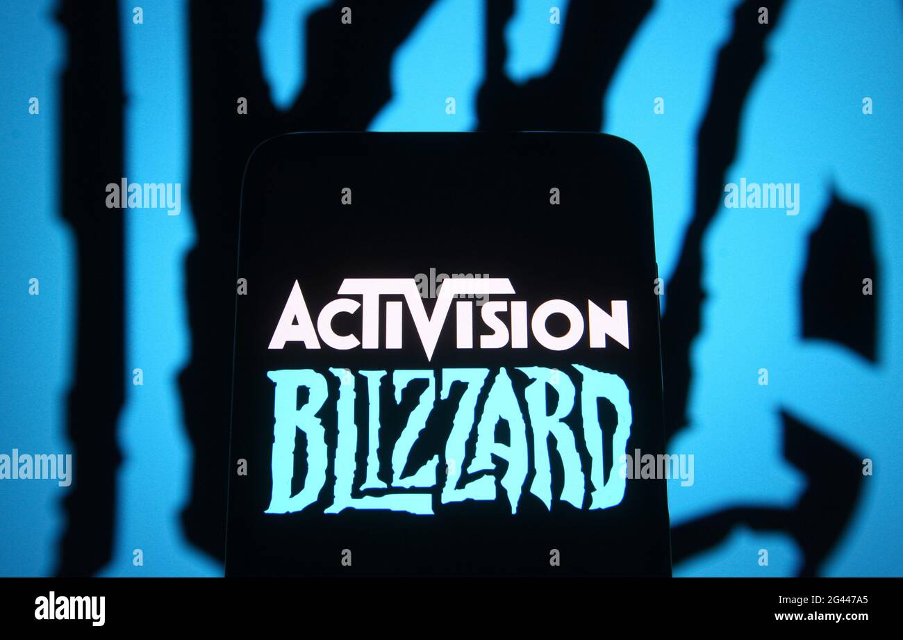 In this photo illustration, Activision Blizzard logo of a video game  company is seen on a smartphone screen in front of Blizzard Entertainment  logo. (Photo by Pavlo Gonchar / SOPA Images/Sipa USA, image size:1300x921