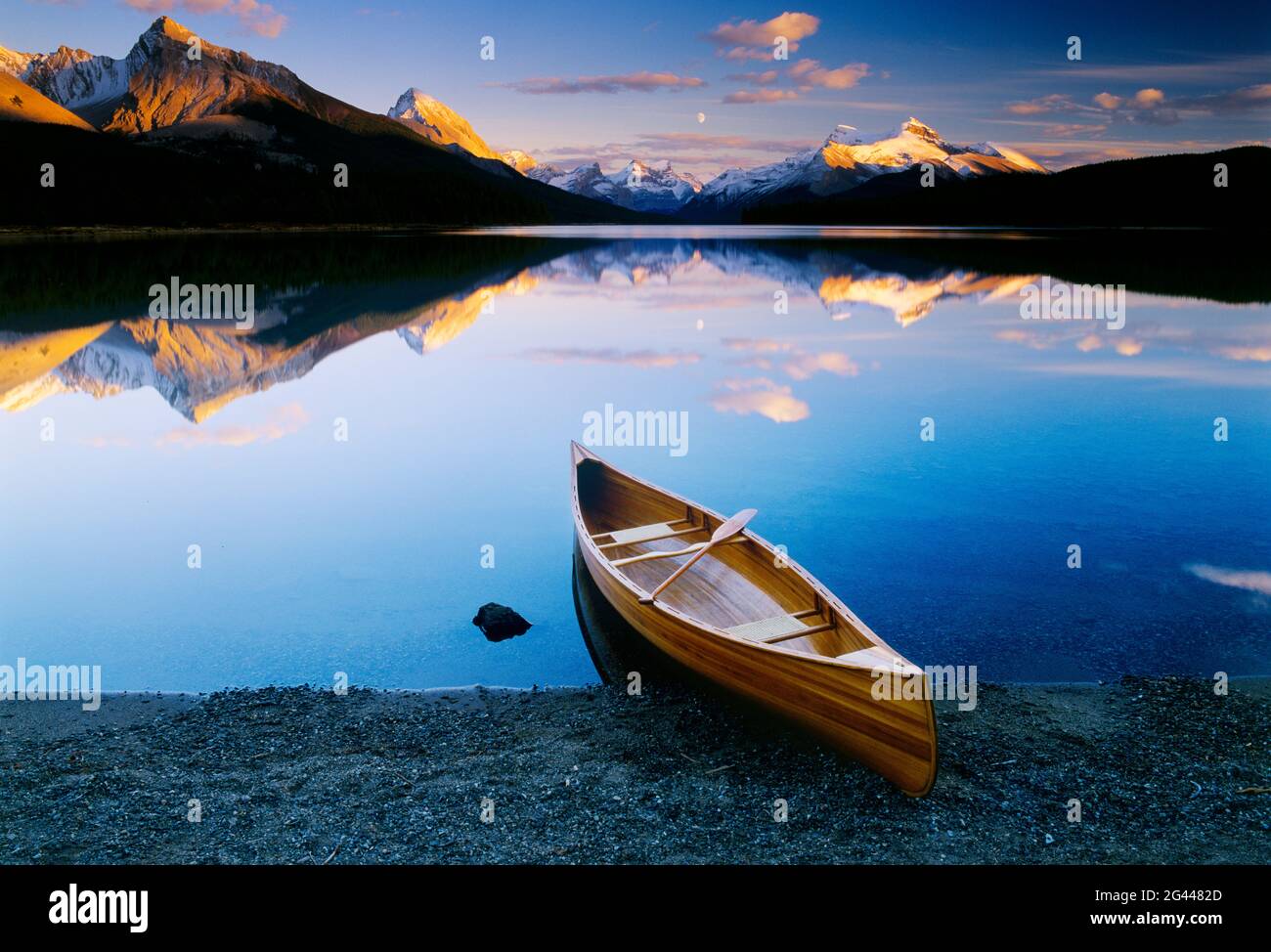 Canoe on shore of Maligne Lake, Jasper National Park, Alberta, Canada Stock Photo
