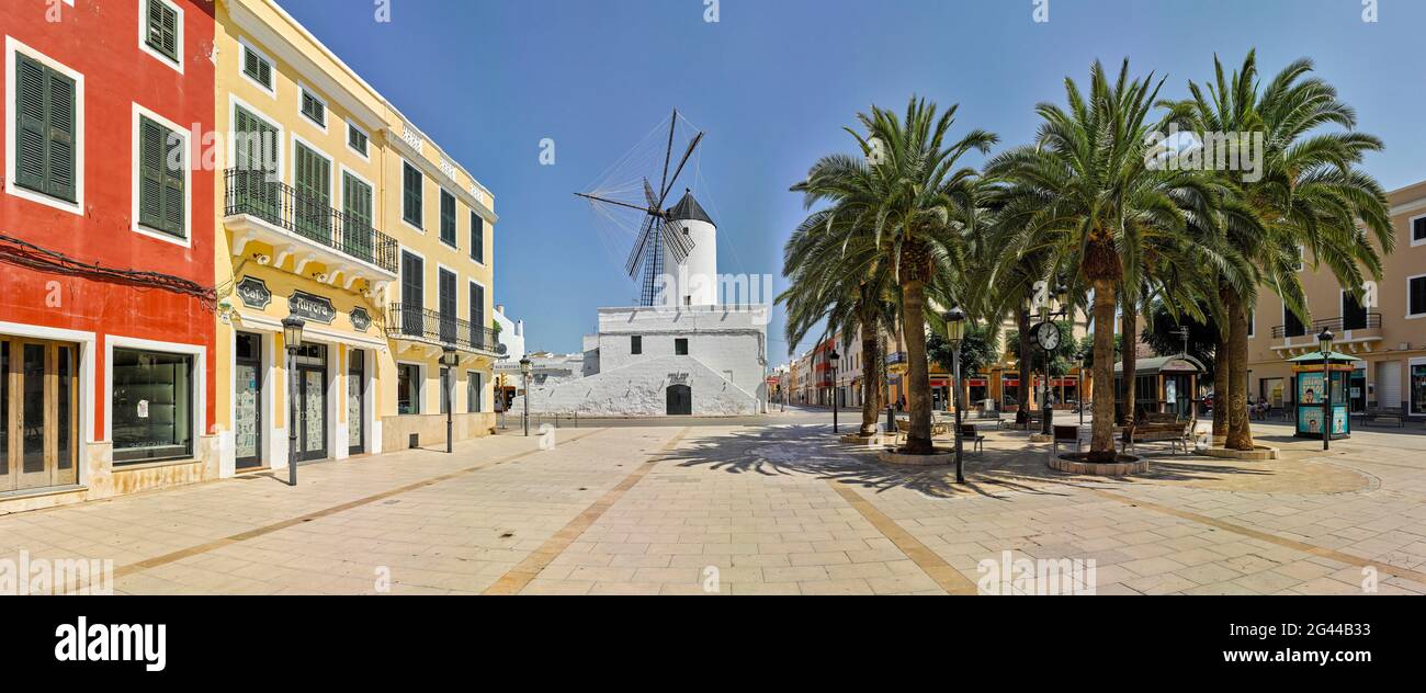 Town square with windmill and palm trees, Plaza de Alfonso III, Ciutadella, Menorca, Spain Stock Photo
