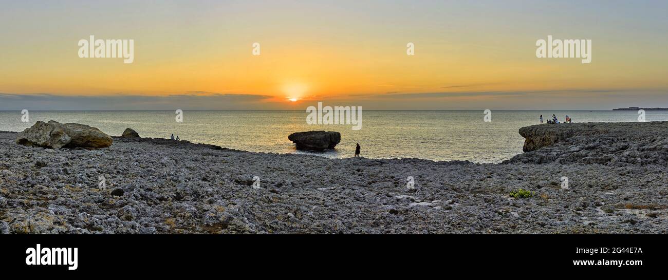 Landscape with beach at sunset, Cala Blanca, Ciutadella, Menorca, Spain Stock Photo