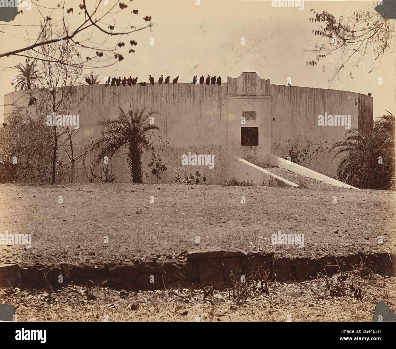 Towers of Silence - Bombay. Dakhma (or Dachma) on Malabar Hill in Bombay (Mumbai). On the Building Vultures (?) That seemed to eat the layers. Stock Photo