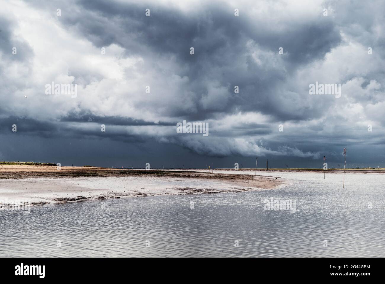 Storm clouds over the Wadden Sea National Park, Spiekeroog, East Frisia, Lower Saxony, Germany, Europe Stock Photo