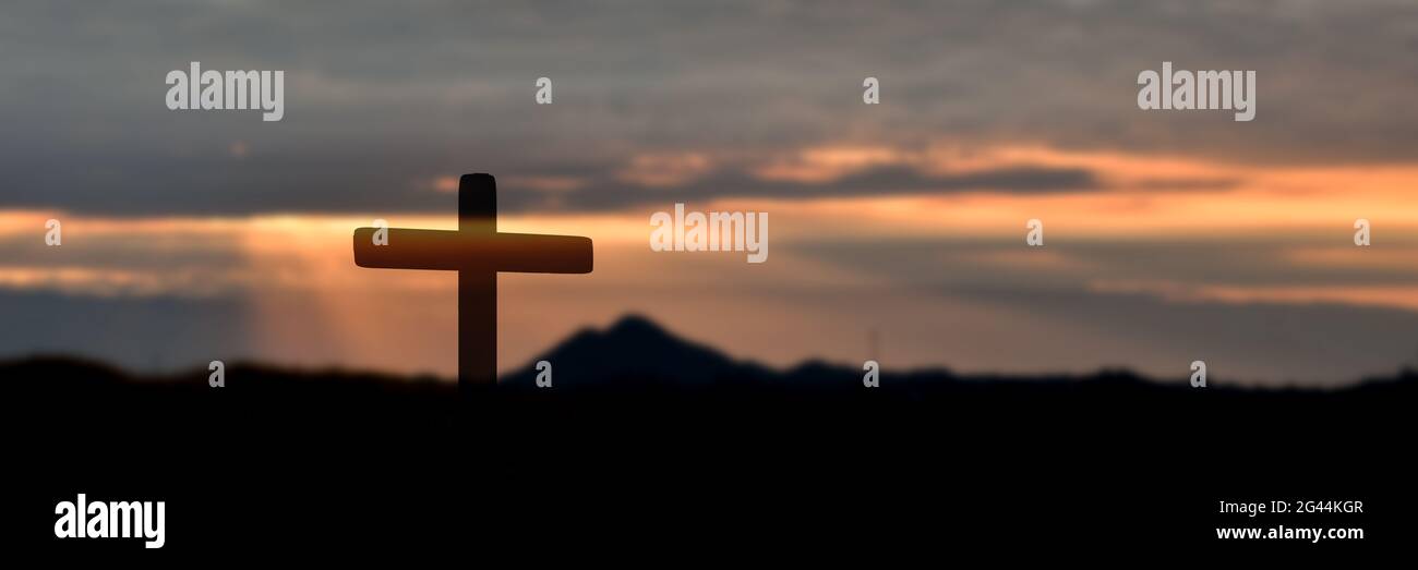 Silhouette of catholic cross at sunset background. panorama picture Stock  Photo - Alamy