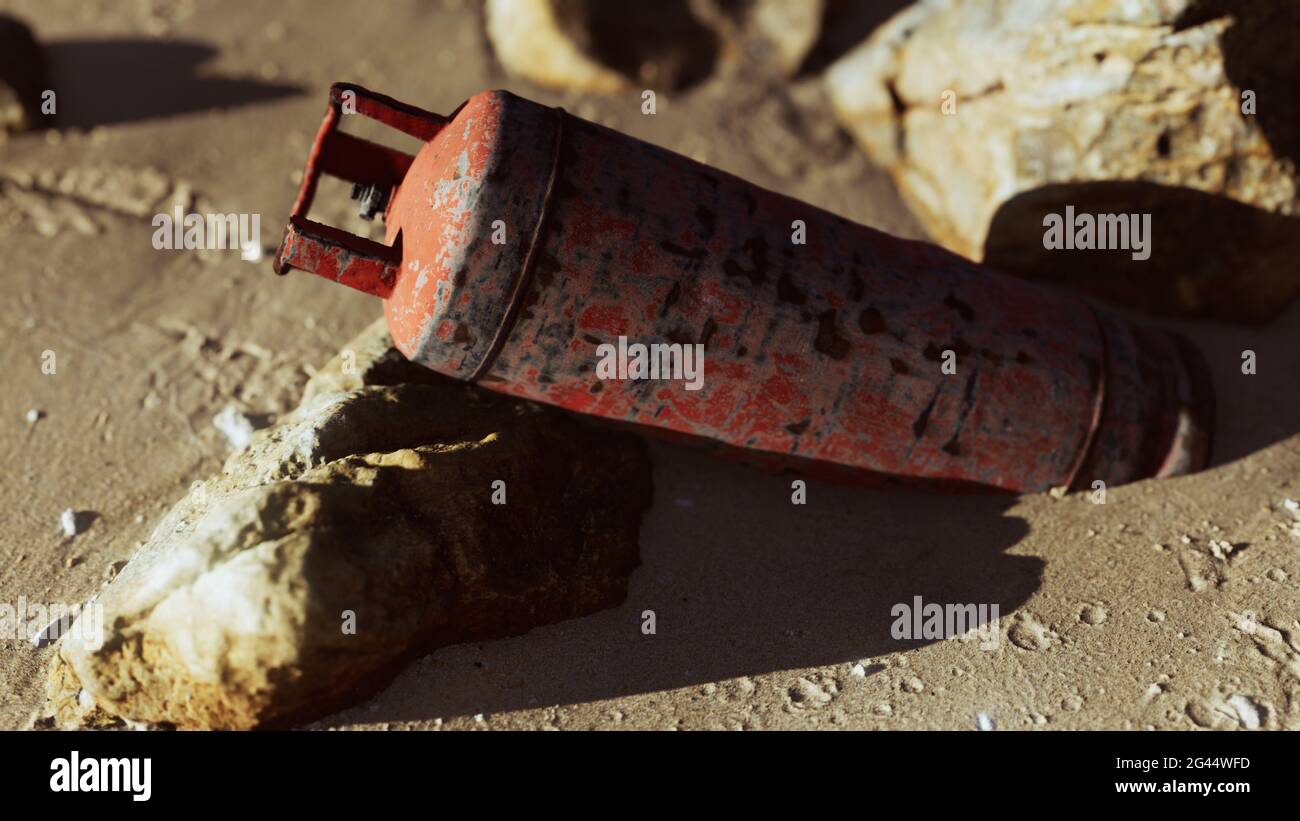 Old rusted gas tank on sand beach Stock Photo Alamy