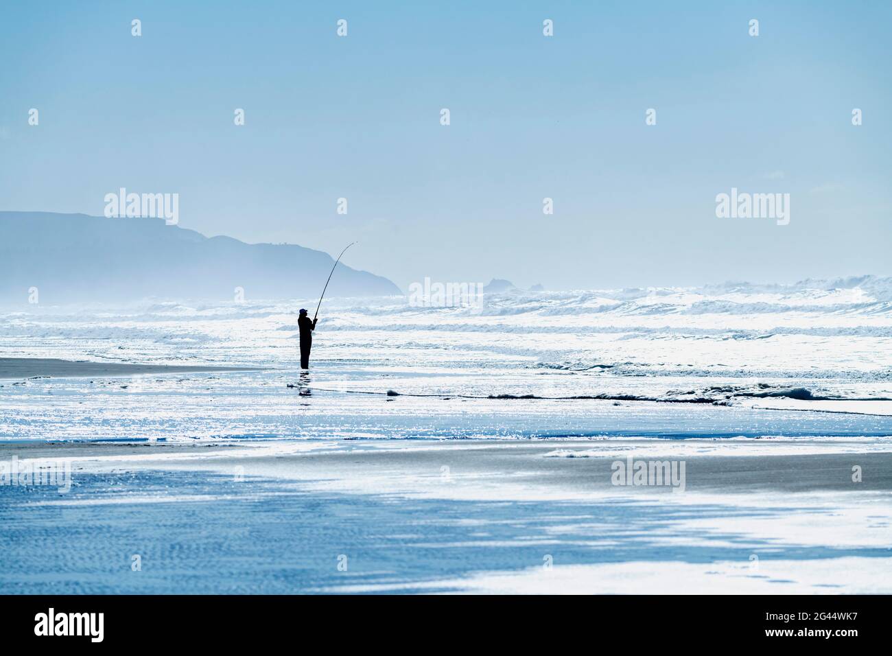 Fisherman fishing in blue Pacific Ocean, California, USA Stock Photo