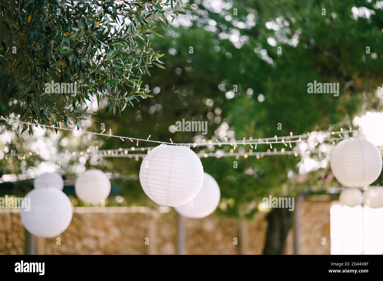 Paper lanterns. A garland of paper balls. Stock Photo