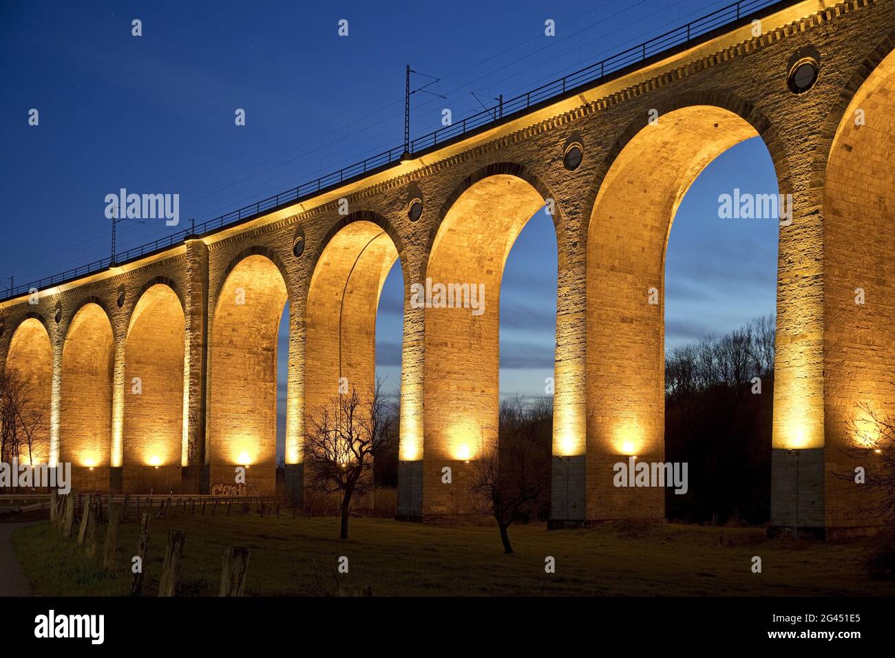 Illuminated viaduct in the evening, largest sand-lime stone bridge in Europe, Altenbeken, Germany Stock Photo