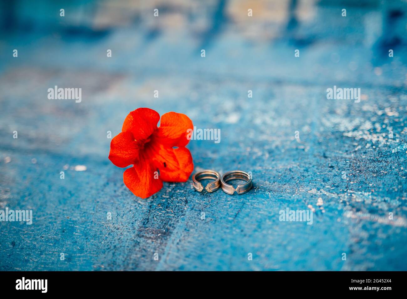 Wedding rings on a textured background Stock Photo