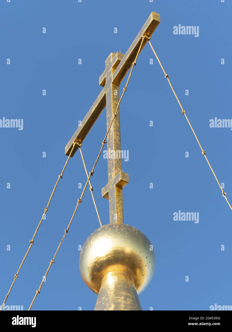 Golden dome with orthodox cross close-up on a blue sky background Stock ...