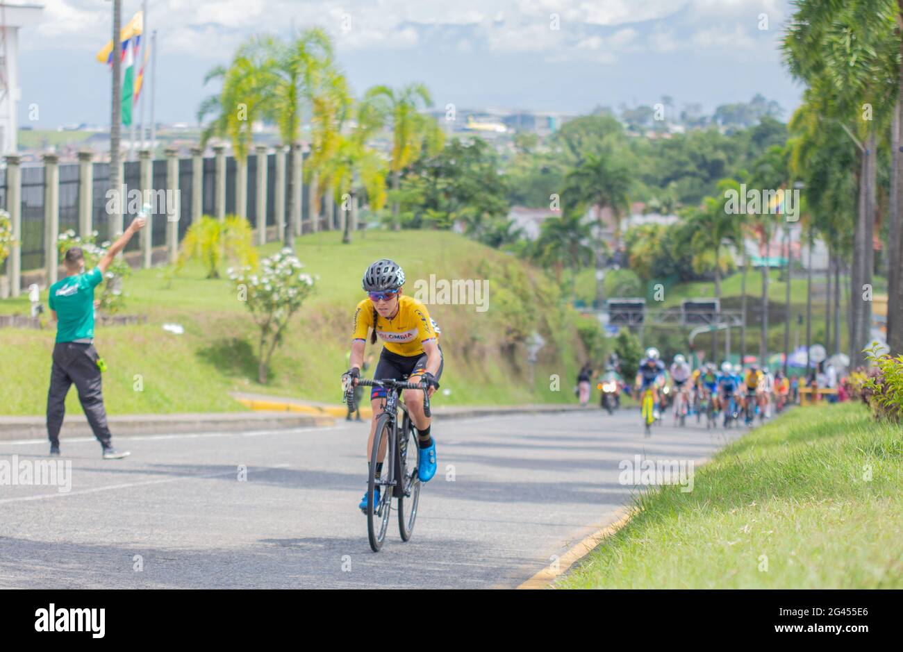 Pereira, Colombia. 18th June, 2021. Cyclist Jessenia Meneses from the team Colombia Tierra de Atletas participates in the Women's Colombian National Road Race Championship in the streets de Pereira, Colombia on June 18, 2021 Credit: Long Visual Press/Alamy Live News Stock Photo