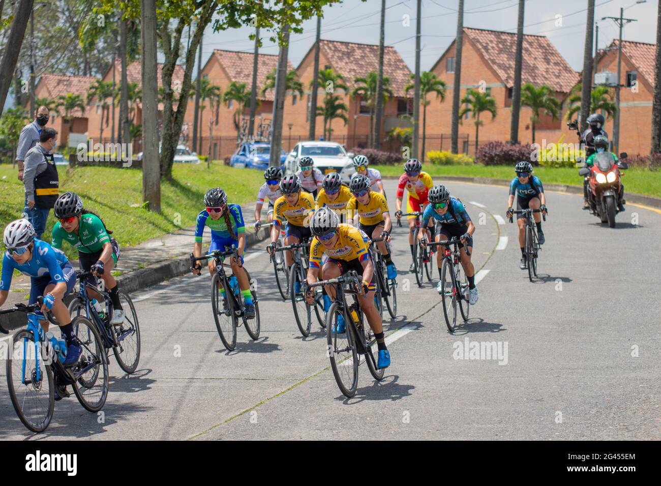 Pereira, Colombia. 18th June, 2021. Cyclists from the Colombia Tierra de Atletas team participate in the Women's Colombian National Road Race Championship in the streets de Pereira, Colombia on June 18, 2021 Credit: Long Visual Press/Alamy Live News Stock Photo