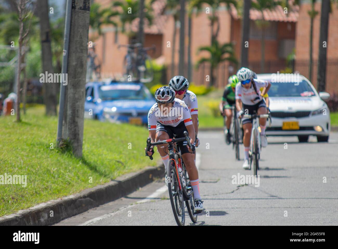 Pereira, Colombia. 18th June, 2021. Cyclists from the Colnago team participate in the Women's Colombian National Road Race Championship in the streets de Pereira, Colombia on June 18, 2021 Credit: Long Visual Press/Alamy Live News Stock Photo