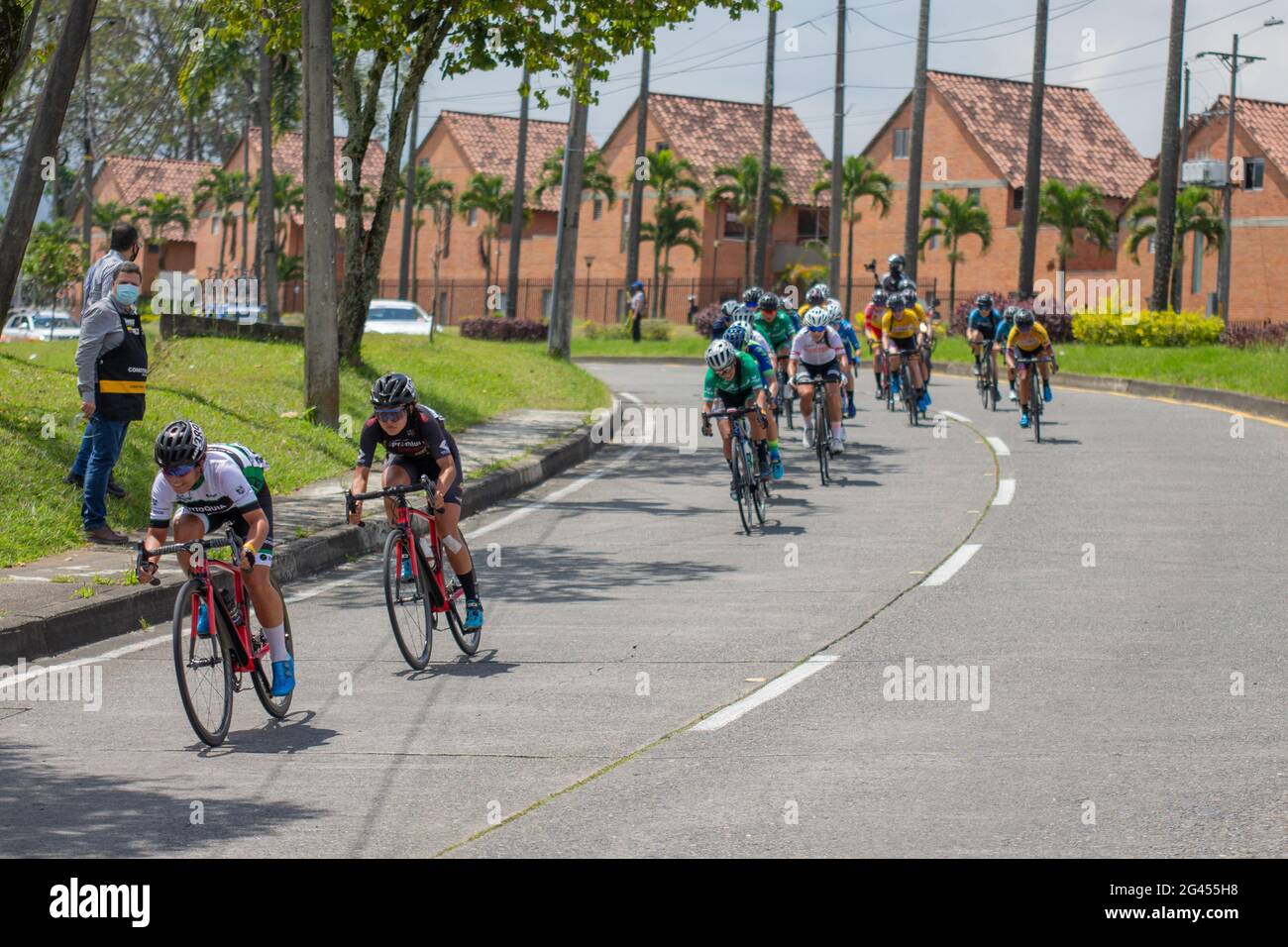 Pereira, Colombia. 18th June, 2021. Cyclists from the Antioquia Cycling leage participate in the Women's Colombian National Road Race Championship in the streets de Pereira, Colombia on June 18, 2021 Credit: Long Visual Press/Alamy Live News Stock Photo