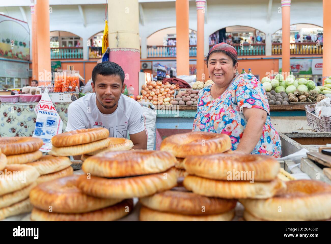 Khujand/Tajikistan-05.18.2020:The view of stall full of traditional tajik round wheat baked bread in bazaar in Tajikistan Stock Photo