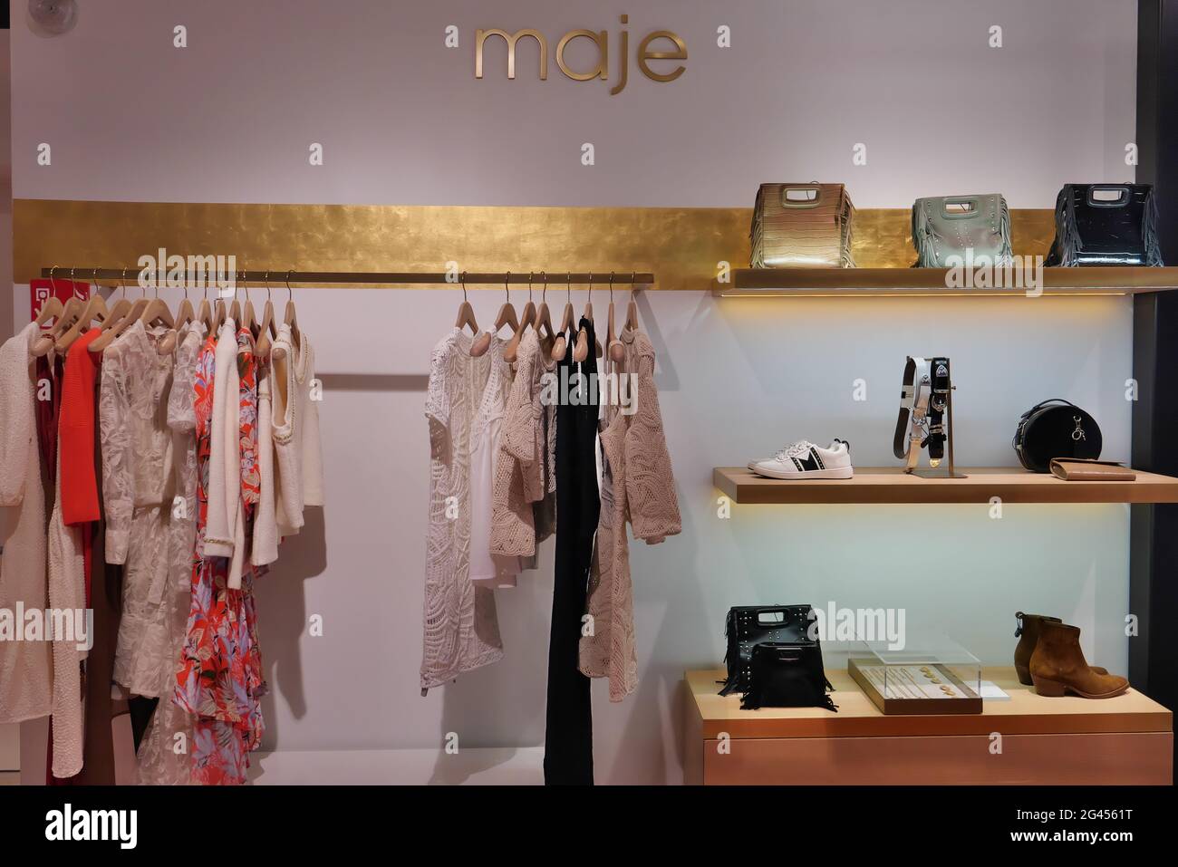 BAGS AND CLOTHES ON DISPLAY AT MAJE BOUTIQUE INSIDE THE RINASCNETE FASHION  STORE Stock Photo - Alamy
