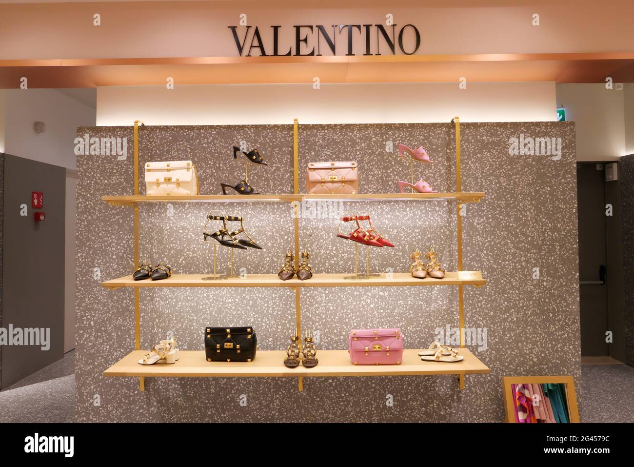 SHOES AND BAGS ON DISPLAY AT VALENTINO BOUTIQUE INSIDE THE RINASCENTE  FASHION STORE Stock Photo - Alamy