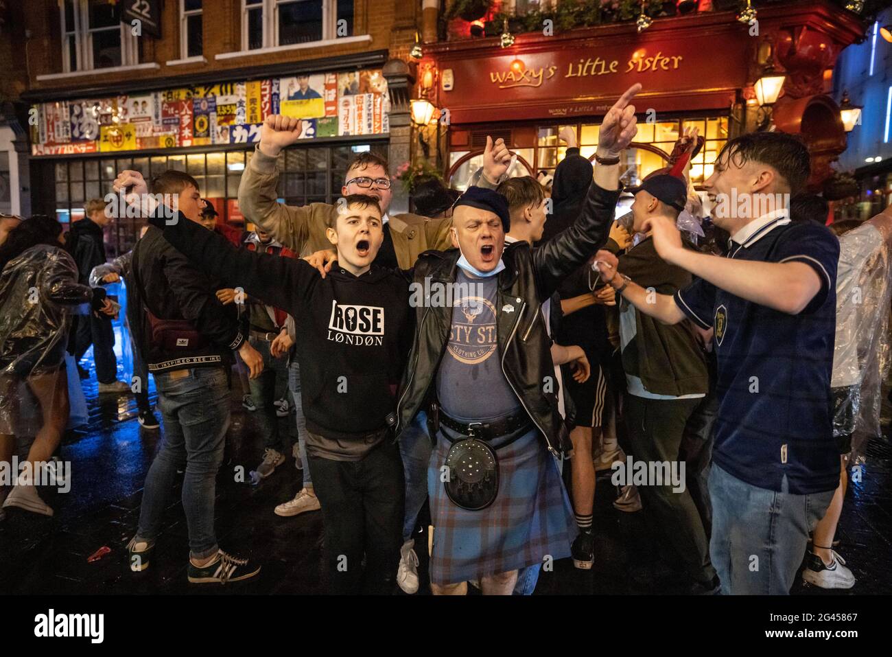 London, UK. 18th June, 2021. Scottish fans celebrate in Leicester Square area after drawing 0-0 with England in the Euro21 Match on Friday night. Credit: Jeff Gilbert/Alamy Live News Stock Photo