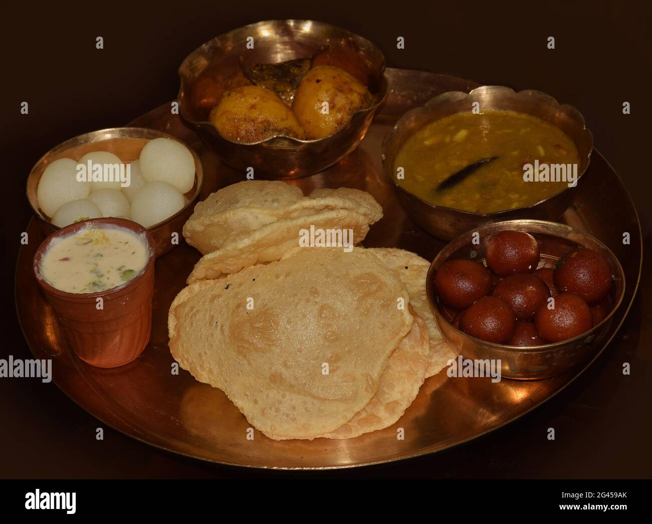 Traditional Jamai Sasthi Bengali Food thali served in brass utensils