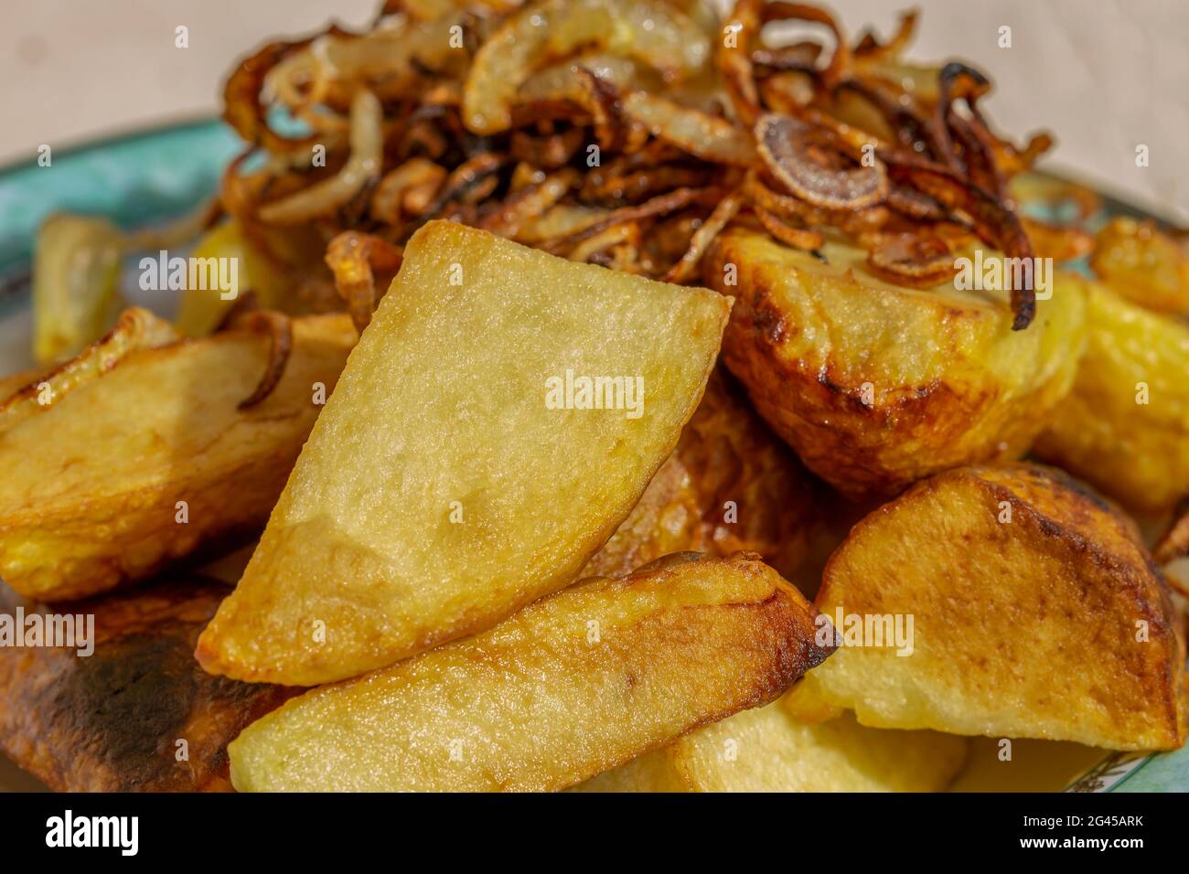 fried onions with potatoes chips Stock Photo Alamy
