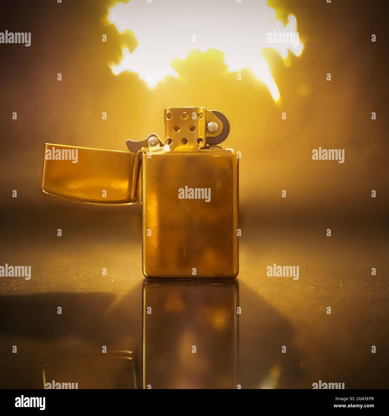 a lighter from which fire comes out Stock Photo