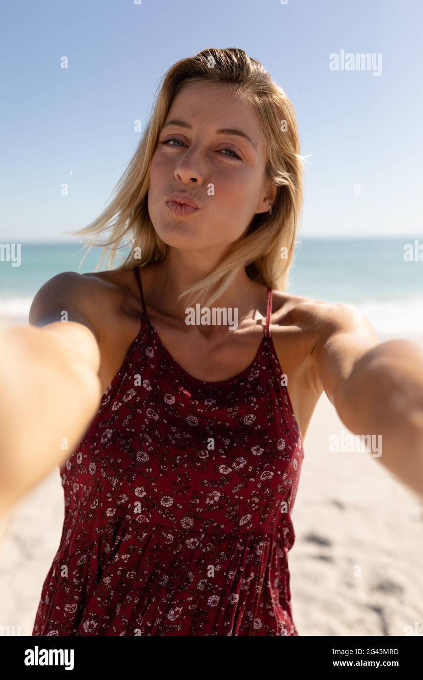 woman-taking-selfies-on-the-beach-hi-res-stock-photography-and-images
