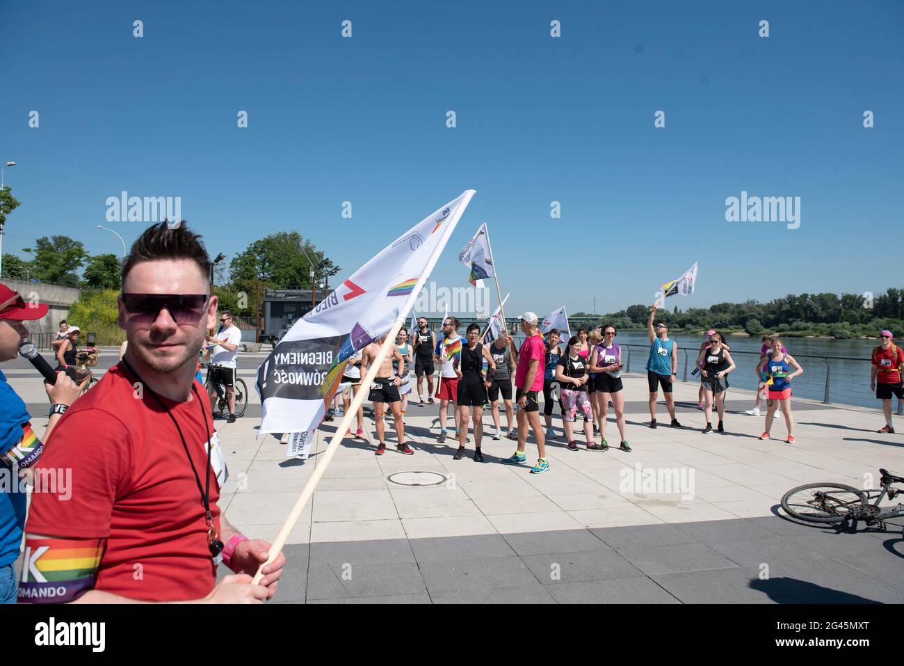 Warsaw, Warsaw, Poland. 19th June, 2021. Participants of the Equality Jog are seen before the start of the run on June 19, 2021 in Warsaw, Poland. A dozen of people participated in the 2nd Equality Jog, organised by the activist group Homokomando, that consists in a 5 Km route and takes place before the Warsaw's Pride Parade. Credit: Aleksander Kalka/ZUMA Wire/Alamy Live News Stock Photo