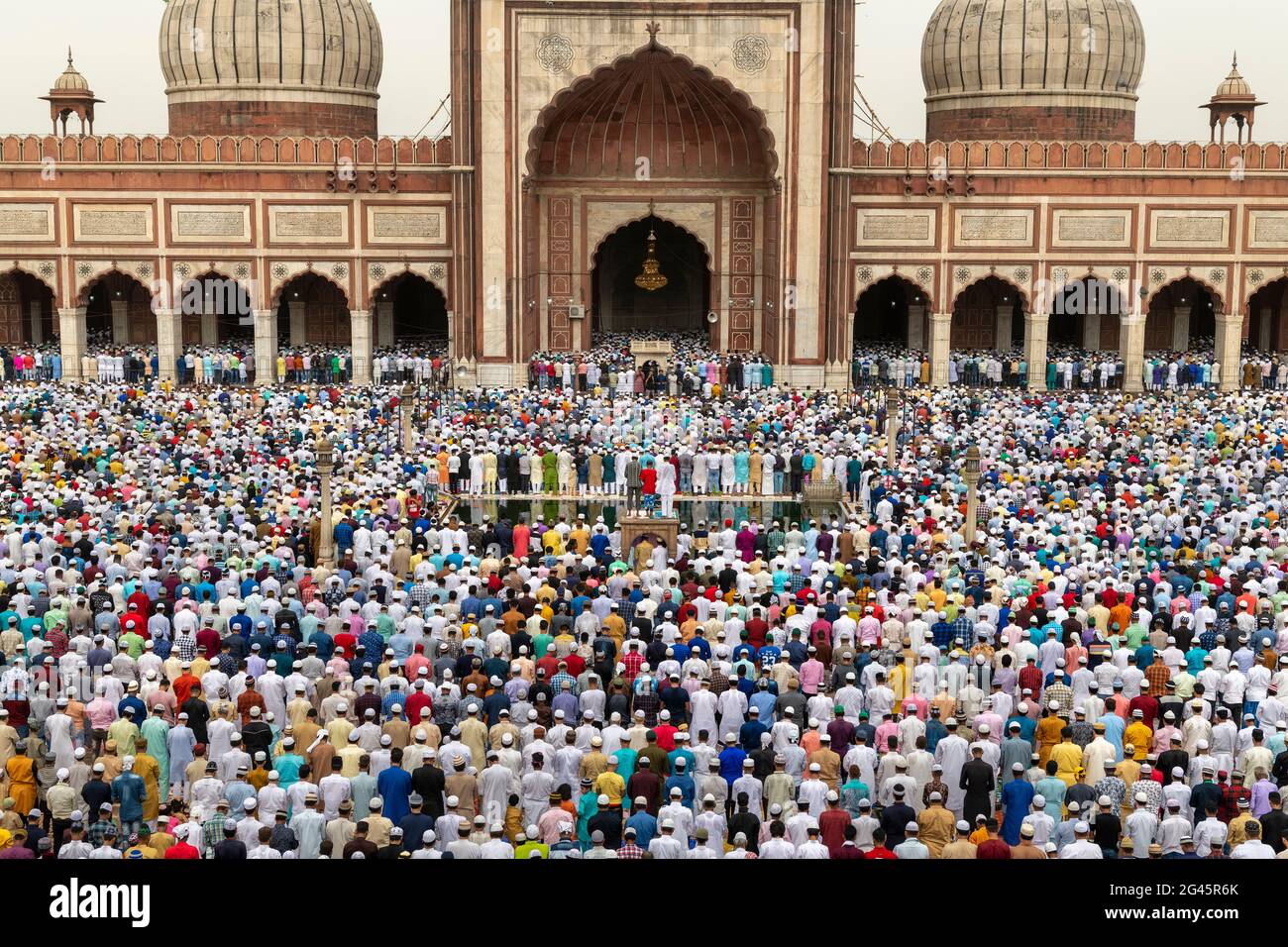 Thousands of Muslim men offers Eid-ul-fitr namaz at the Masjid-i Jehan-Numa or the Jama Masjid of Delhi. It is one of the largest mosques in India, Stock Photo