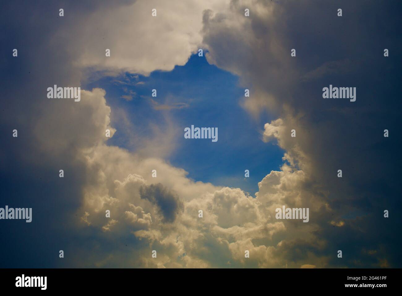 Blue hole in the clouds Stock Photo