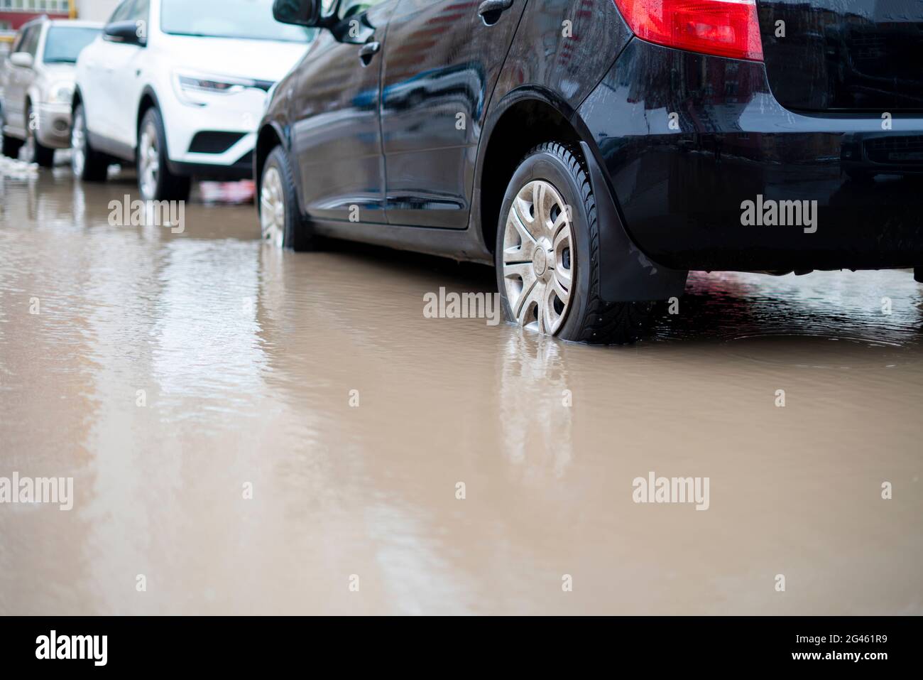 cars move in water road, flood disaster outside Stock Photo - Alamy
